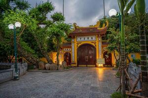 Hanoi, Vietnam - 25 Jun 2024 Tran Quoc Pagoda, the oldest Buddhist temple in Hanoi, is located on a small island near the southeastern shore of West Lake, Hanoi, Vietnam. photo