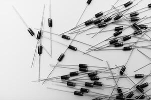 A scattering of radio elements on a white background. Diodes. photo