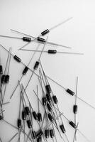 A scattering of radio elements on a white background. Diodes. photo