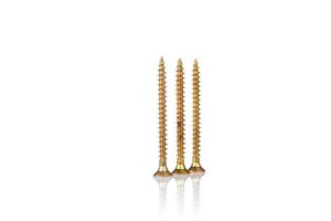 macro screw of golden color on a white background photo