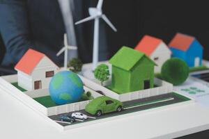 Green energy business company meeting with business people planning and discuss marketing of sustainable and renewable clean energy product with solar cell and wind turbine generator. Trailblazing photo