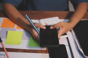 The designer team is designing the uxui system to make the uxui system work well on new phones and support system updates. Website development concept UI UX front end designer photo