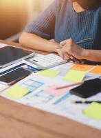 The designer team is designing the uxui system to make the uxui system work well on new phones and support system updates. Website development concept UI UX front end designer photo