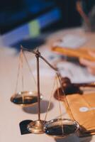 Judge gavel with Justice lawyers having team meeting at law firm background. Concepts of Law and Legal services. photo