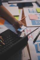 The designer team is designing the uxui system to make the uxui system work well on new phones and support system updates. Website development concept UI UX front end designer photo
