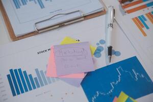 businessman working data document graph chart report marketing research development planning management strategy analysis financial accounting. Business office concept. photo