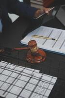 Law theme, gavel or mallet of the judge, lawyer enforcement officers, evidence-based cases taken into account in the court abount business, legislation. photo