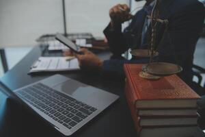 Law theme, gavel or mallet of the judge, lawyer enforcement officers, evidence-based cases taken into account in the court abount business, legislation. photo