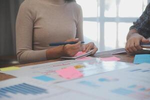 Team of business people working together in the meeting room office, teamwork background charts and graphs banner, double exposure successful teamwork,business planning concept. photo