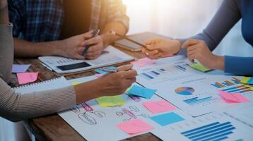 Team of business people working together in the meeting room office, teamwork background charts and graphs banner, double exposure successful teamwork,business planning concept. photo