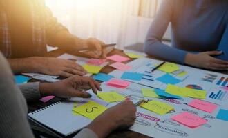 Team of business people working together in the meeting room office, teamwork background charts and graphs banner, double exposure successful teamwork,business planning concept. photo