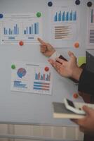 Audit concept,Administrator business man financial inspector and secretary making report calculating balance. Internal Revenue Service checking document. photo