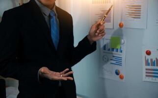 Audit concept,Administrator business man financial inspector and secretary making report calculating balance. Internal Revenue Service checking document. photo