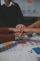 Hand join together for work togetherness, Hand stack for business and service, Team volunteering or teamwork. Concept connection of community and charity. Group of business workforce participation. photo