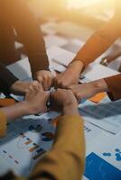 Hand join together for work togetherness, Hand stack for business and service, Team volunteering or teamwork. Concept connection of community and charity. Group of business workforce participation. photo