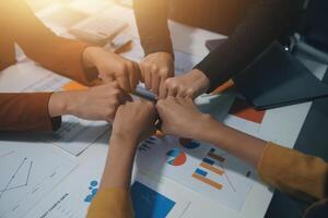 Hand join together for work togetherness, Hand stack for business and service, Team volunteering or teamwork. Concept connection of community and charity. Group of business workforce participation. photo