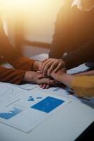 Hand join together for work togetherness, Hand stack for business and service, Team volunteering or teamwork. Concept connection of community and charity. Group of business workforce participation. photo