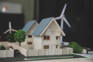 Green energy business company meeting with business people planning and discuss marketing of sustainable and renewable clean energy product with solar cell and wind turbine generator. Trailblazing photo