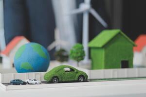 Green energy business company meeting with business people planning and discuss marketing of sustainable and renewable clean energy product with solar cell and wind turbine generator. Trailblazing photo