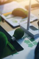 Green energy business company meeting with business people planning and discuss marketing of sustainable and renewable clean energy product with solar cell and wind turbine generator. Trailblazing photo