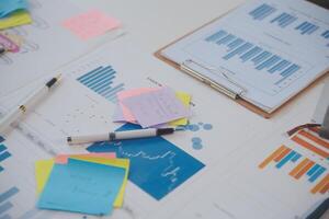 businessman working data document graph chart report marketing research development planning management strategy analysis financial accounting. Business office concept. photo