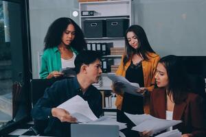 Stress, business people and employee frustrated with multitasking, pressure or overworked by team in chaos with paperwork. Anxiety, headache and worker overwhelmed by group and burnout in crisis photo