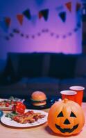 Joyful office Halloween party with coworkers in costumes, celebrating with drinks and laughter, fostering teamwork and festive spirit photo