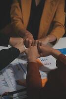 Hand join together for work togetherness, Hand stack for business and service, Team volunteering or teamwork. Concept connection of community and charity. Group of business workforce participation. photo