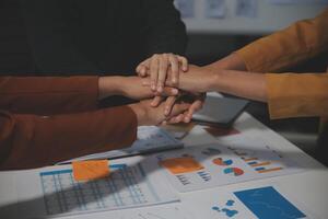 Hand join together for work togetherness, Hand stack for business and service, Team volunteering or teamwork. Concept connection of community and charity. Group of business workforce participation. photo