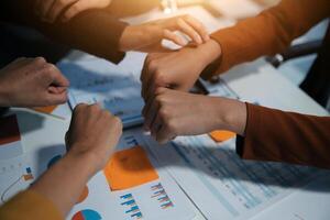 Hand join together for work togetherness, Hand stack for business and service, Team volunteering or teamwork. Concept connection of community and charity. Group of business workforce participation. photo