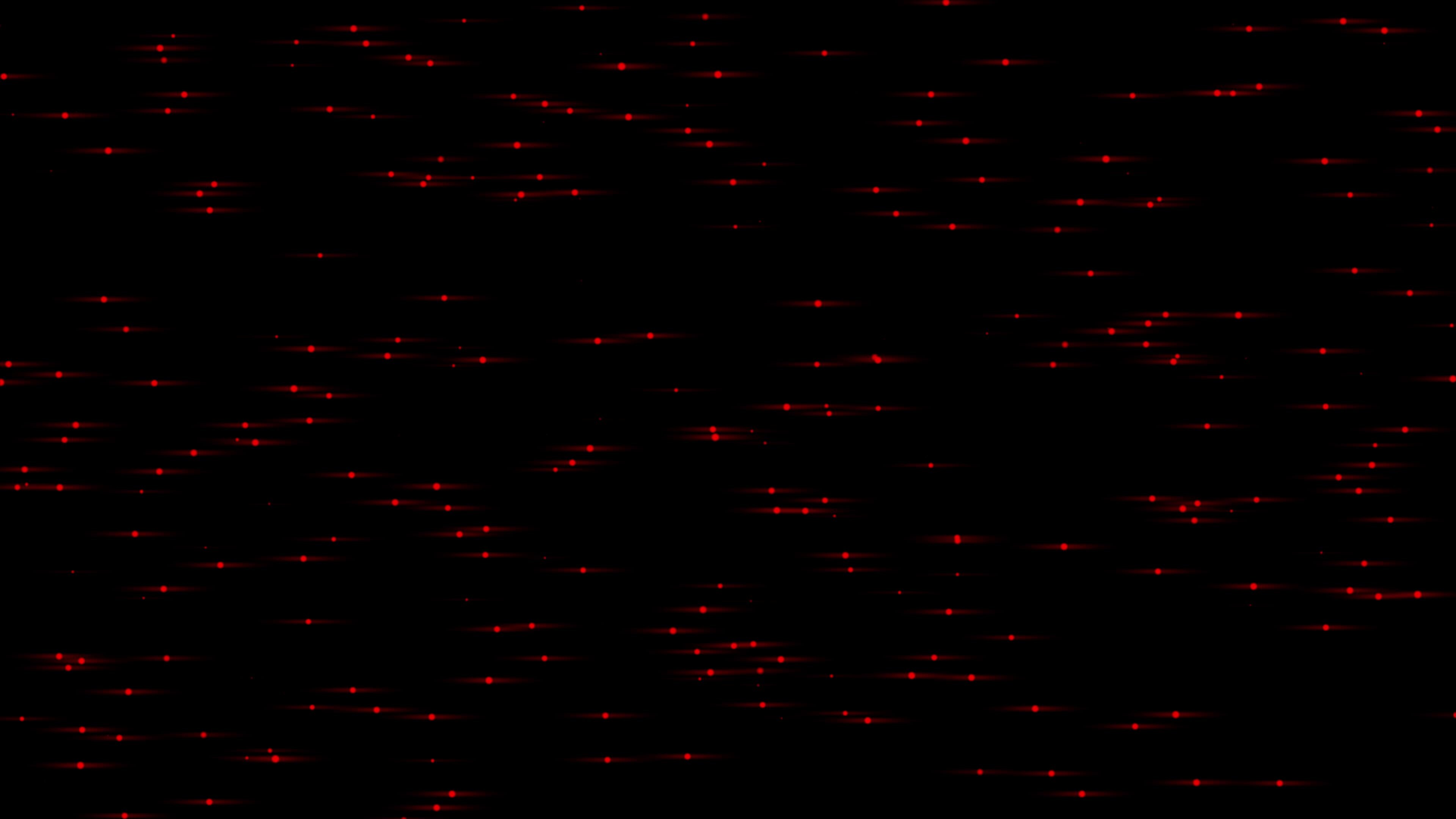 red color tiny small glowing and flickering particles slowly moving on
