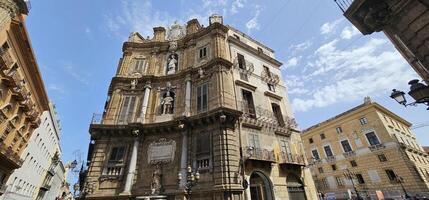 The Quattro Canti, or Piazza Villena, or Octagon of the Sun, or Teatro del Sole, is the name of an octagonal square at the intersection of the two main roads of Palermo Via Maqueda and the Cassaro photo