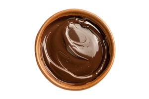 Top view of creamy chocolate spread in jar. png