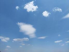a view of the sky with clouds and a few clouds photo