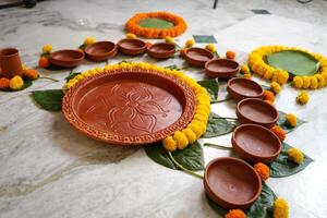 Full earthenware set for serving food in Bengali occasion photo