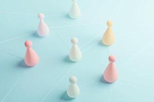 A network of pastel figurines symbolizing connection and collaboration on a soft blue background photo