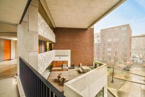 A view of the courtyard from the balcony of a building photo