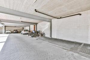 An empty garage with bikes parked in it photo