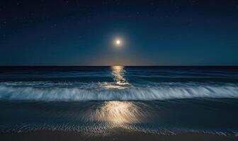 Bright moon casting a long reflection on the ocean photo