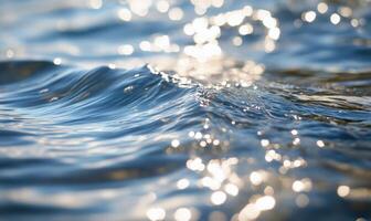 Close-up of small waves in a lake, sunlight sparkling on the water photo