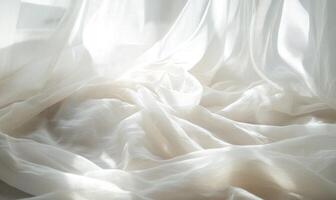 Sheer, billowing fabric, softly glowing with sunlight photo