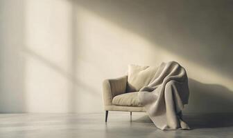 A white couch with a blanket draped over it sits in a room with a window photo