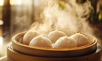 A steaming bowl of dumplings with steam rising from it photo