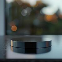 A black and silver object on a table photo