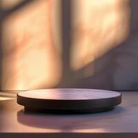 A black and white plate on a table in front of a window photo