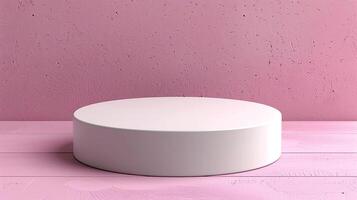 A white round cake stand on a pink background photo