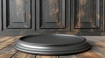 An empty pedestal on a wooden floor in front of a wall photo