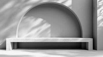 A white bench sitting in front of a wall photo