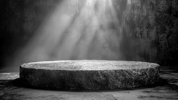 A black and white photo of a stone table in a dark room