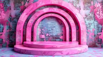 A pink stage with a large arch in front of it photo